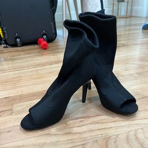 Open toed black heeled booties